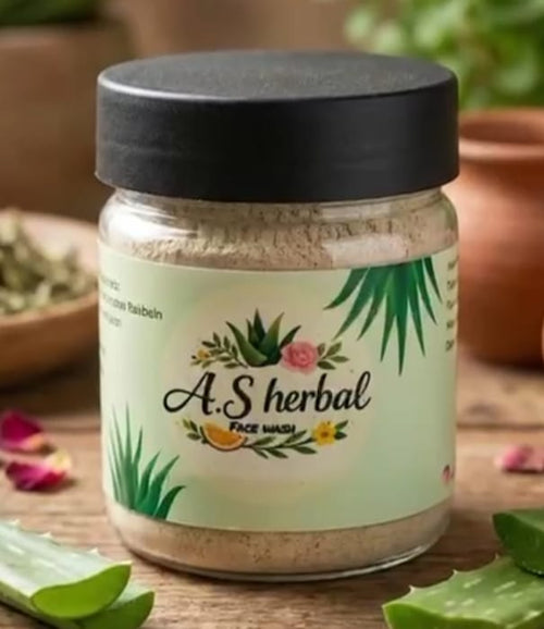 Jar of A.S Herbal face wash with a black lid on a wooden surface.